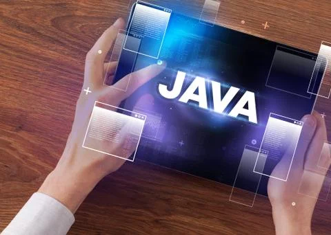 Close-up of a hand holding tablet Stock Photos