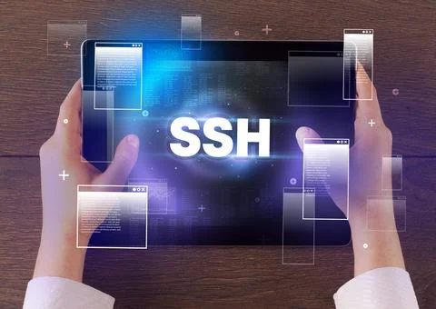 Close-up of a hand holding tablet Stock Photos