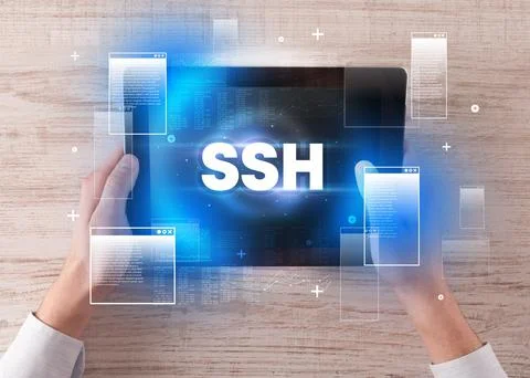 Close-up of a hand holding tablet Stock Photos