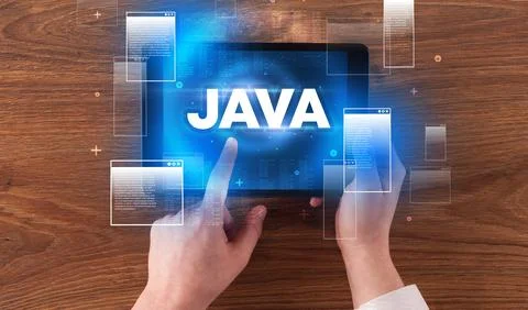 Close-up of a hand holding tablet Stock Photos