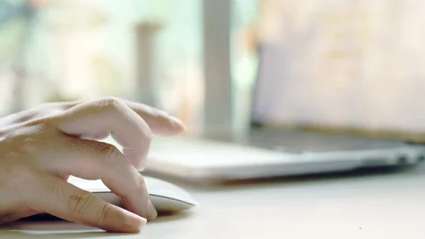 Close up hand holding white stylish mouse by her hand, Lady Video stock 106124063