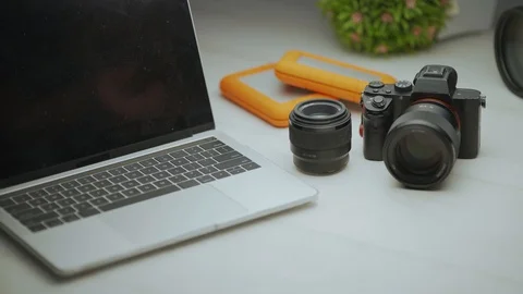 Close up of hand insert the MMC card into the professional camera Video stock 128406608