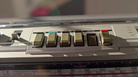 Close Up Hand Inserting Cassette Into Retro Boombox Slow Motion Stock Footage 330092652