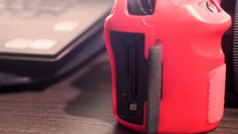 Close up of hand inserting CF card (Compact Flash) and SD card into DSLR Camera Stock-Footage 107907915