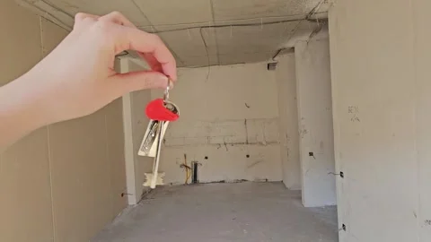 Close up of a hand jingling keys to a new apartment Видео 338005738