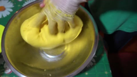 Close up hand kneading mashed potatoes Stock Footage 146001226