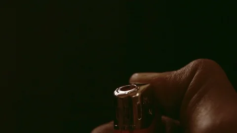 Close up of hand lighting a lighter Stock Footage 90524334