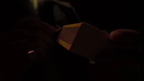 Close-up of hand lighting a match in slow motion Video stock 131519299