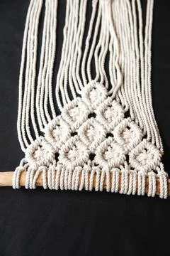Close-up of hand made macrame texture pattern. Handmade macrame 100 cotton Stock Photos