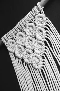Close-up of hand made macrame texture pattern. Handmade macrame 100 cotton Stock Photos