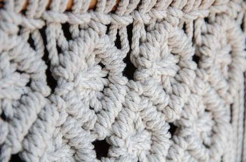 Close-up of hand made macrame texture pattern. Handmade stylish 100 cotton wa Stock Photos