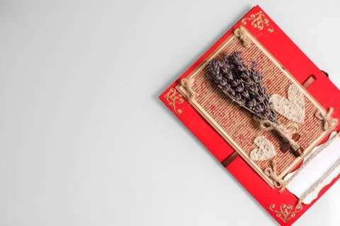 Close-up of a hand-made post card with lavender, hearts and copy space Stock Photos