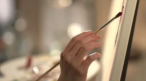 Close up of hand making brush strokes Stock Footage 56238009