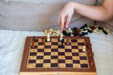 Close-up of hand making chess move. Stock Photos
