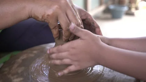 Close up hand making pots with pottery crafts 動画素材 167425397