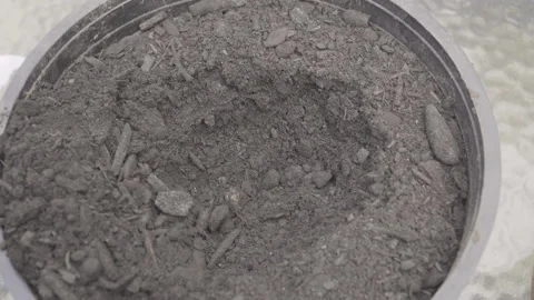 Close up on hand making a small pot in potting soil and planting Stock Footage 152645187