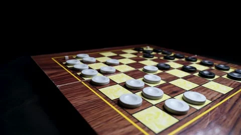 Close-up of Hand Making a Strategic Move in a Game of Checkers, Capturing an Opp Vidéo 330434983