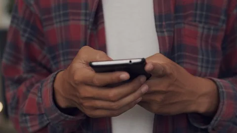Close- up  Hand of male using smartphone Stock Footage 114157124