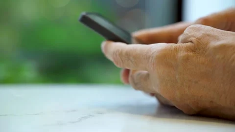 Close-up of hand males looking at smartphone. Stock Footage 284064006