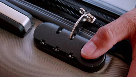 Close up hand man close suitcase with combination lock. Stock Footage 197015398