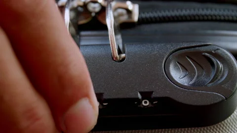 Close up hand man close suitcase with combination lock. Stock Footage 197015541