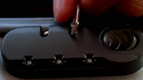 Close up hand man close suitcase with combination lock. Stock Footage 197015639