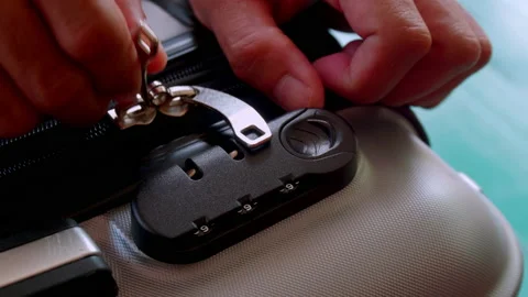 Close up hand man close suitcase with combination lock. Stock Footage 197015641
