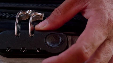 Close up hand man close suitcase with combination lock. Stock Footage 197016087