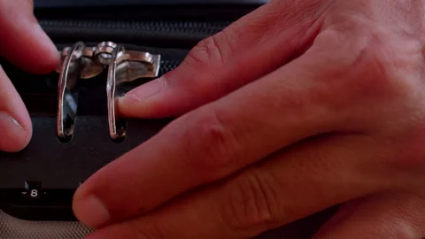 Close up hand man close suitcase with combination lock. Stock Footage 197016189