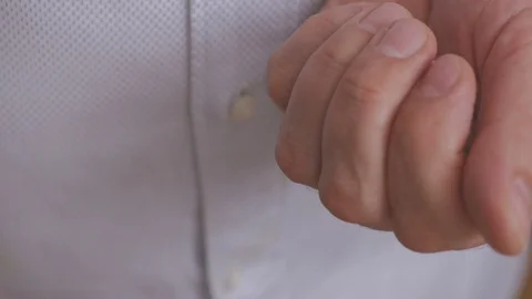 Close up of the hand of a man holding a tablet in his palms. Video stock 101087184