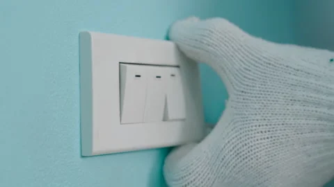 Close-up hand of man opening light switch cover to install or repair. Stock Footage 326177195