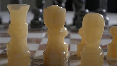 Close-up of the hand of a man playing chess. 動画素材 103268629