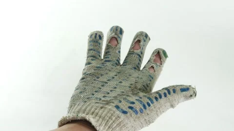 Close-up hand of a man with ragged construction gloves on a white background. Stock Footage 143014272