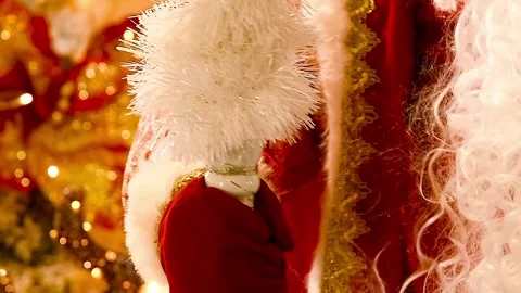 Close-up of the hand of a man in a red Santa Claus costume with a white bea.. Stock-Footage 342388869