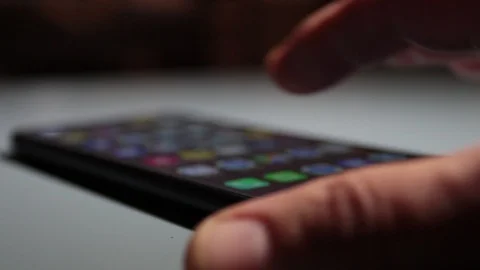 Close-up, hand of man scrolling the social media page on a smart phone Stock Footage 120567733
