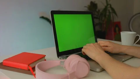 Close up hand man use laptop computer with green screen chroma key display Stock Footage 114061368