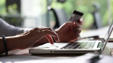 Close up hand man using laptop with credit card e-commerce shopping online Stock Footage 218311275