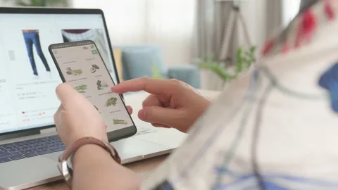 Close Up Hand Man Using Smartphone And Laptop Computer Order Vegetables Stock Footage 156558137