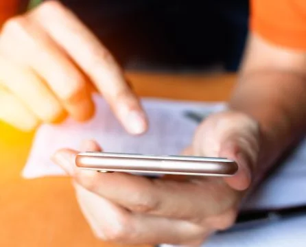 Close up of a hand man using  smartphone Stock Photos