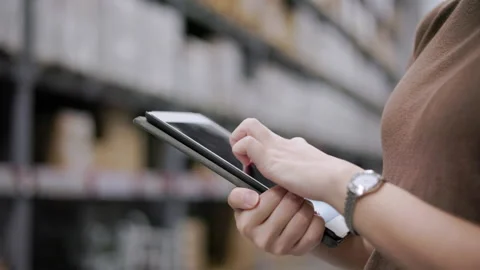 Close-up hand manager worker checklist manage parcel box product with tablet. Stock Footage 214248813