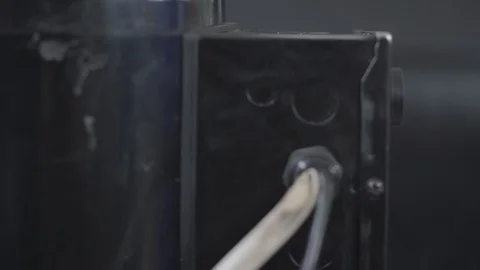 Close up hand of mechanic in glove push the button of elevator to lift car Stock Footage 103701203
