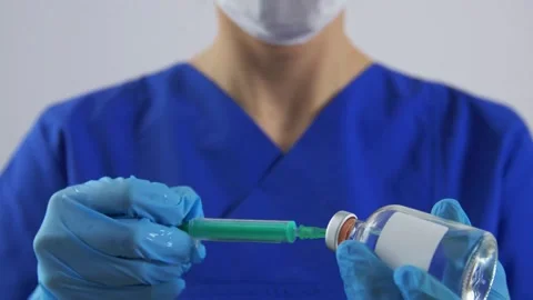 Close up hand of medical staff to preparing anesthesia in dentistry Female Stock-Footage 336587229
