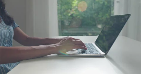Close up. Hand of middle woman using laptop at home office natural light Video stock 337392266