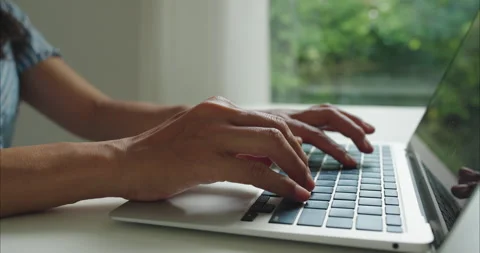 Close up. Hand of middle woman using laptop at home office natural light Stock Footage 337392487