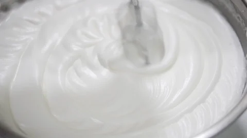 Close-up hand mixer beat the egg whites Stock Footage 92232379