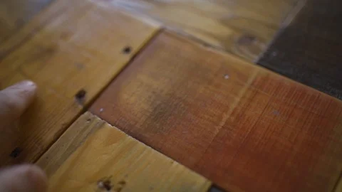 Close up - hand moving and touching a recycled wood art piece / furniture Stock Footage 109044677