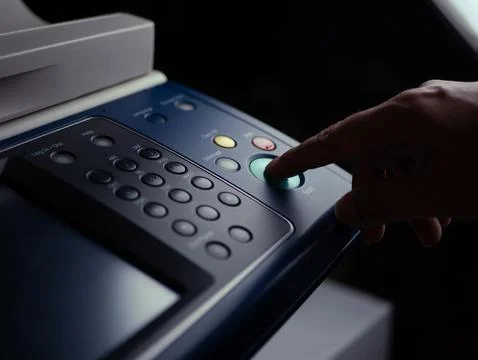 Close up hand office man press start button on panel to using the Office pr.. 스톡 사진