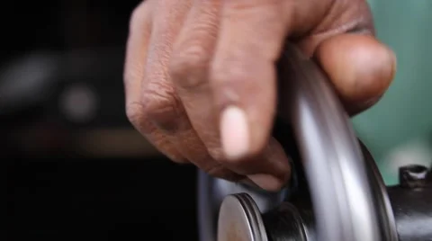 Close up hand on old sewing machine Stock Footage 65779039