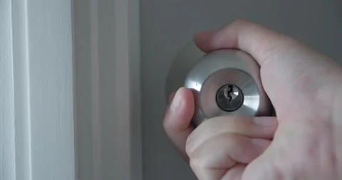 Close up of hand open locking door knobs of white door. Man hand open door knob. 스톡 동영상 156440873