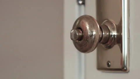 Close-Up of a Hand Opening and Closing a Door Stock Footage